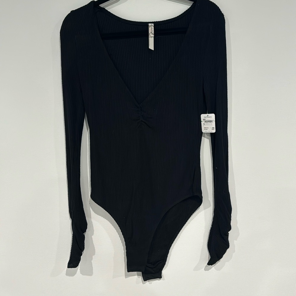 Free people, bodysuit, size large, never worn with tag